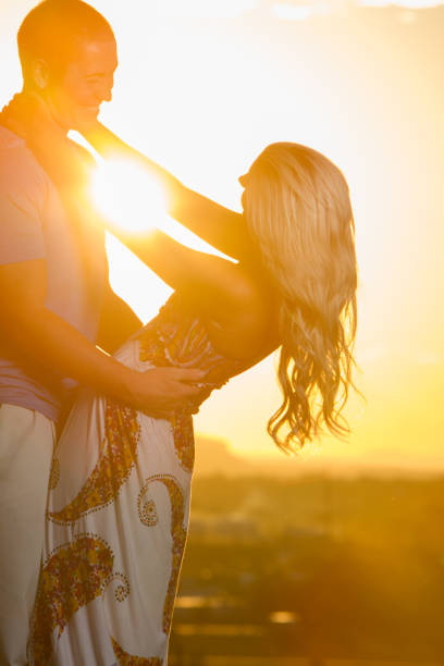 istock Young Couple at Sunset 168626989