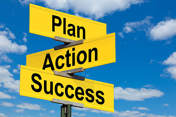 Plan, Action, Success, Intersection Road Sign stock photo