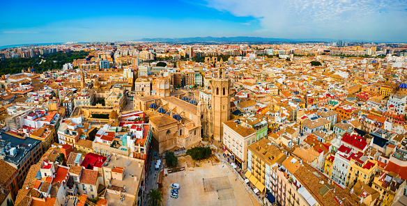 Valencia Metropolitan Cathedral or Basilica of the Assumption of Our Lady of Valencia aerial panoramic view in Spain. It is located at the Plaza de la Reina square.