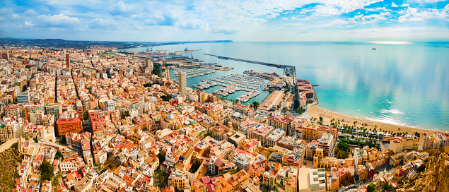 Alicante city port with boats and yachts aerial panoramic view. Alicante is a city in the Valencia region, Spain.