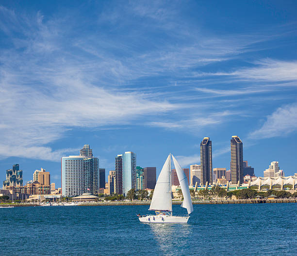 San Diego Skyline, California (P) San Diego Skyline with sail boat and dramatic sky, CA marina california stock pictures, royalty-free photos & images