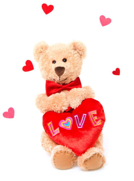 A beautiful bear cub with a heart in its paws, a heart with love.