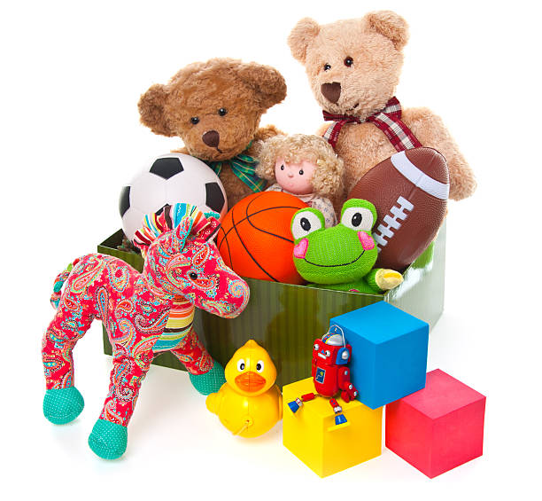 donazione completa di giocattoli e animale imbalsamato - bambola giocattolo foto e immagini stock