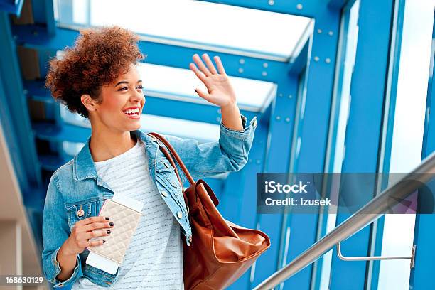 Teen Girl At The Airport Stock Photo - Download Image Now - Waving - Gesture, Leaving, Airport