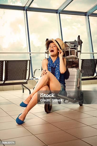 Happy Tourist Stock Photo - Download Image Now - Suitcase, Sitting, Women