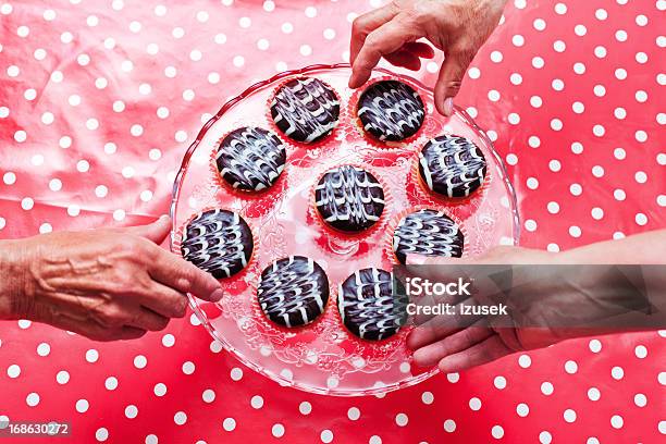 Senior Hands And Cookies Stock Photo - Download Image Now - High Angle View, Cookie, Cupcake
