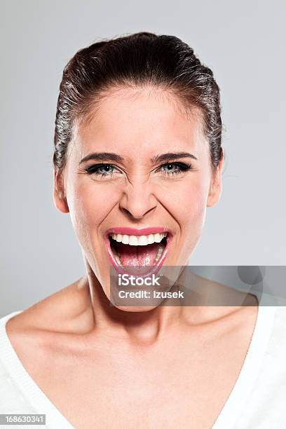 Young Woman Screaming Studio Portrait Stock Photo - Download Image Now - Mouth Open, One Woman Only, Women