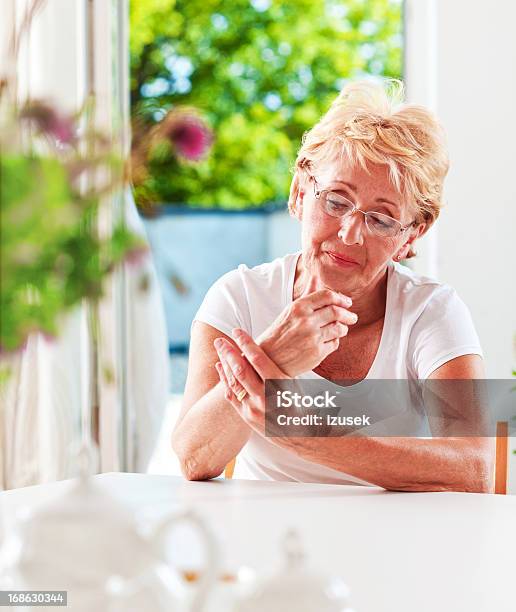 Wrist Pain Stock Photo - Download Image Now - Arthritis, One Woman Only, Women
