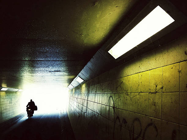 Motorcyclist in tunnel