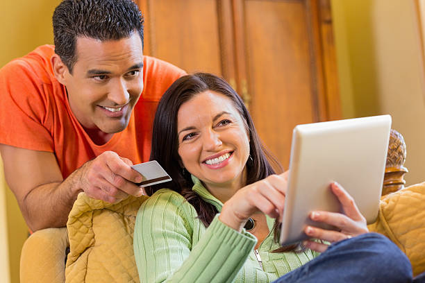 istock Happy Couple Shopping Online 168632489