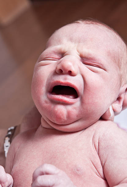 istock Crying Newborn Baby Girl 168634248