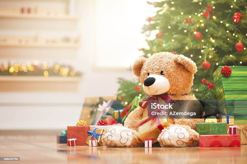 Christmas morning Christmas gifts under christmas tree in the sunny morning. Christmas Stock Photo