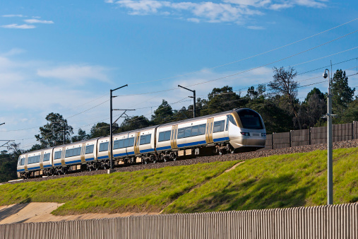 Metro train Gautrain seen going past towards OR Tambo Airport. The Gautrain is an 80-kilometre mass rapid transit railway system in Gauteng Province of South Africa, which links Johannesburg, Pretoria, and OR Tambo International Airport. It is hoped that this railway will relieve the traffic congestion in the Johannesburg–Pretoria traffic corridor and offer commuters a viable alternative to road transport, as Johannesburg has limited public transport infrastructure.