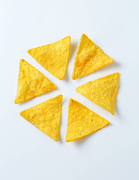 Nachos Nachos isolated on white tortilla chip stock pictures, royalty-free photos & images