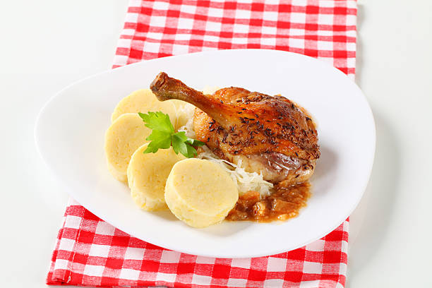 Roasted duck leg with saurekraut and potato dumplings