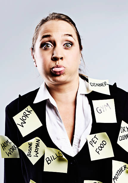 istock Stressed modern woman is overloaded with  task reminders 168635477