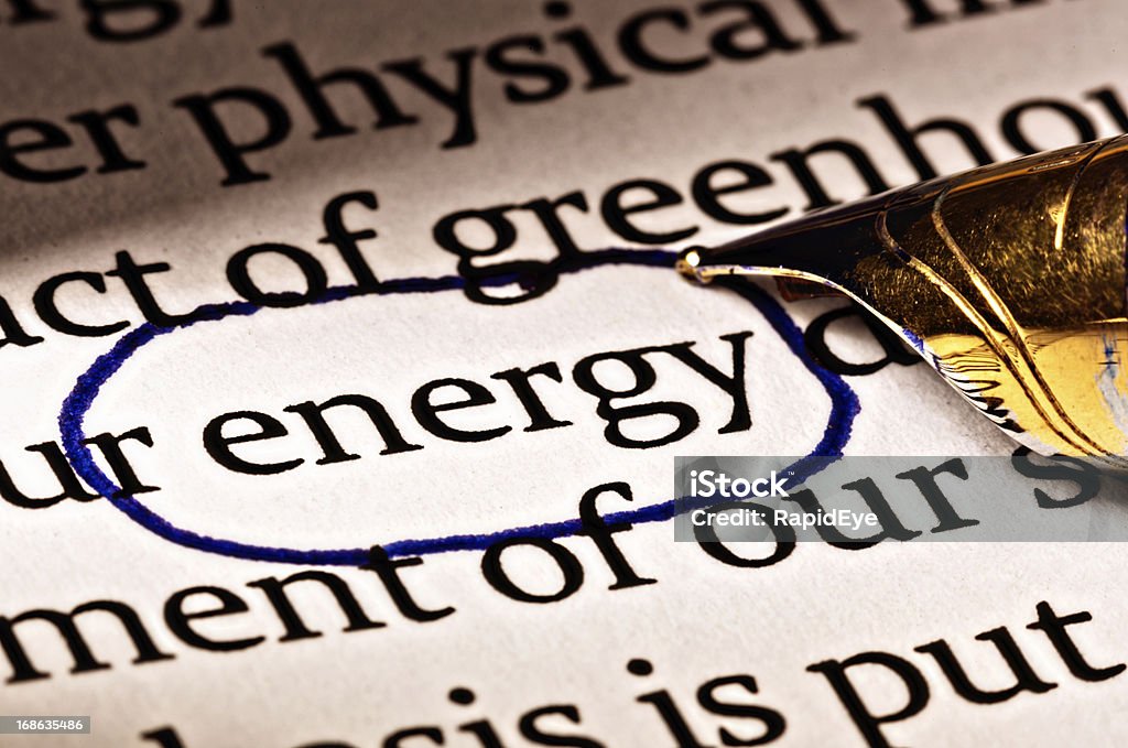 Dans le document, le mot'energy'est encerclée pour accent - Photo de Changement climatique libre de droits