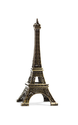 Eiffel tower replica on white background