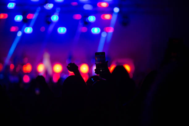 istock Crowd at the disco rise up hands 1686362380