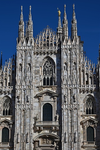 A view of the architecture of the stunning Duomo – Cathedral in the heart of Milan in Italy.