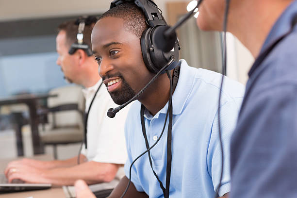 istock Sportscaster or assistant coach watching game in the media box 168639708