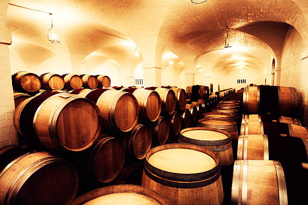 istock Large winery cellar filled with oak barrels of maturing wine 168639871