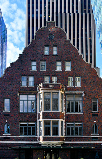 Seattle, King County, Washington state, United States: Rainier Clubhouse - brick façade conveying tradition, power, privilege and solidity - designed by  Kirtland Cutter in Tudor / Jacobethan Revival style', completed in 1904 and listed on the National Register of Historic Places. This gentlemen's private club, named after British Admiral Peter Rainier, was founded by powerful businessmen in the 1880s as Seattle was developing its contacts in commerce: Pacific trade, shipbuilding, banking, gaining railroad connections. 4th Avenue and Columbia Street, Central Business District.