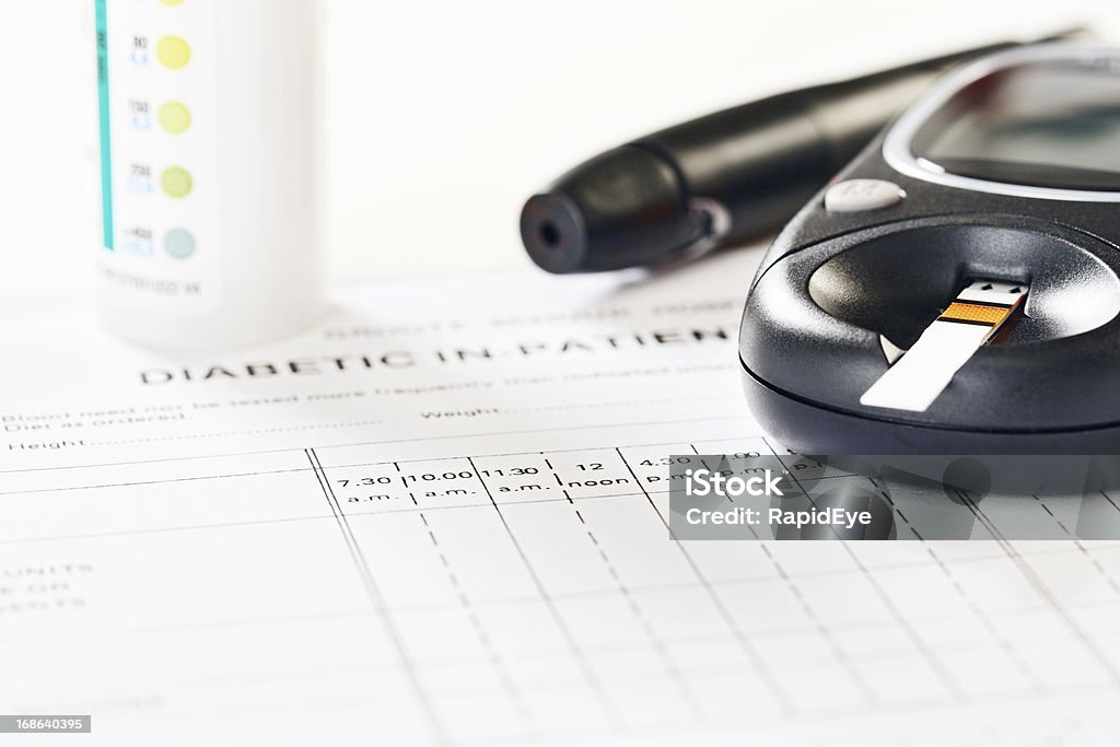 Medical equipment associated with diabetes: a disease on the increase All the diagnostic aids a diabetic needs - a supply of blood test strips, glucometer and automatic insulin dosing pen - rest on a hospital's medical form for recording diabetic details. Diabetes is possibly the world's fastest-growing disease and often caused by  poor lifestyle and eating choices.  Blood Stock Photo