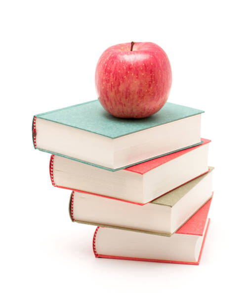 istock Books and Apple isolated on white background 168641764