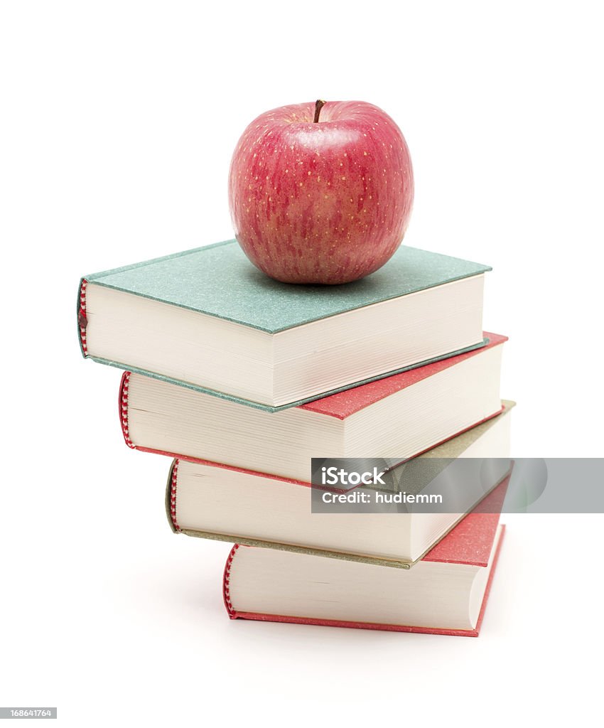 Livros e maçã isolado no fundo branco - Foto de stock de Livro royalty-free