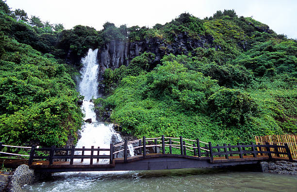 South Korea, Jeju Island, Jungmon Beach, waterfall.