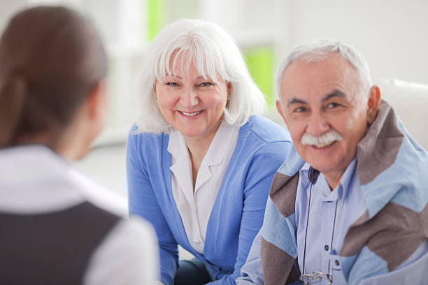 istock Senior couple with consultant. 168644974