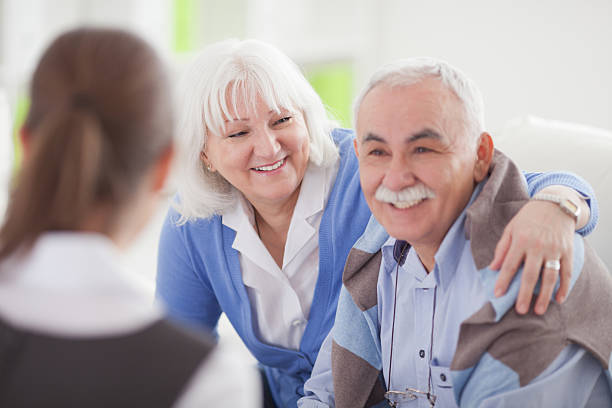 istock Senior couple with consultant. 168644978