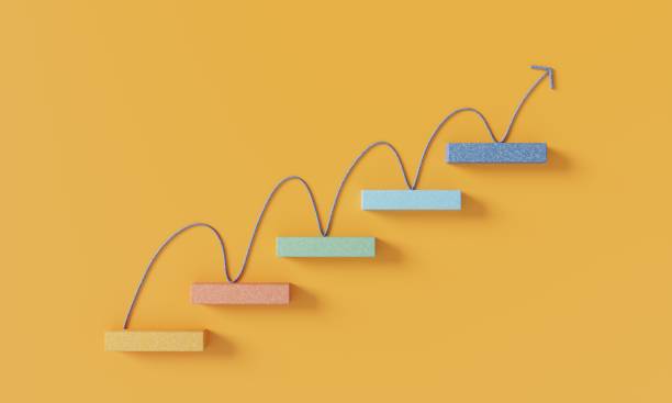 flecha subiendo por las escaleras - desarrollo fotografías e imágenes de stock