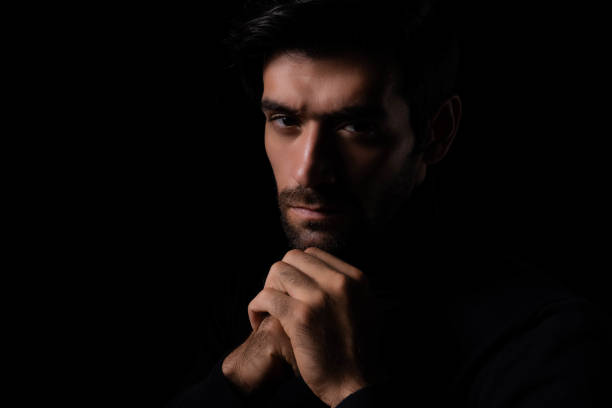 istock Confident Bearded man portrait Thinking stylish young man looking at camera with Black Background Bearded stylish businessman look confident Handsome thoughtful leader young guy thinking something 1686490553