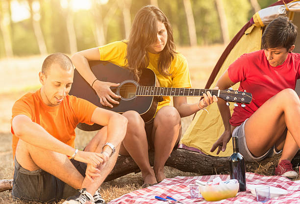istock Friends on a picnic Camping day 168649453