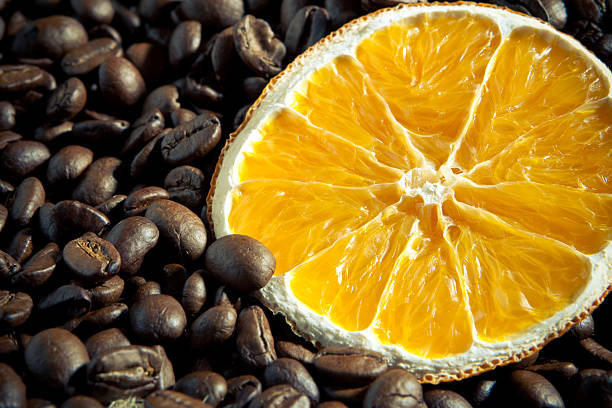 Coffee beans with orange stock photo