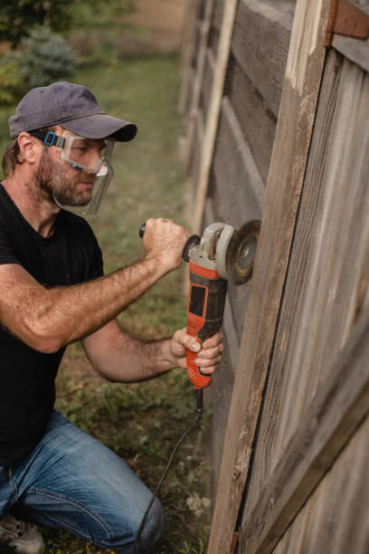 istock Dirty and dusty work with a sanding disc on wood 1686501076