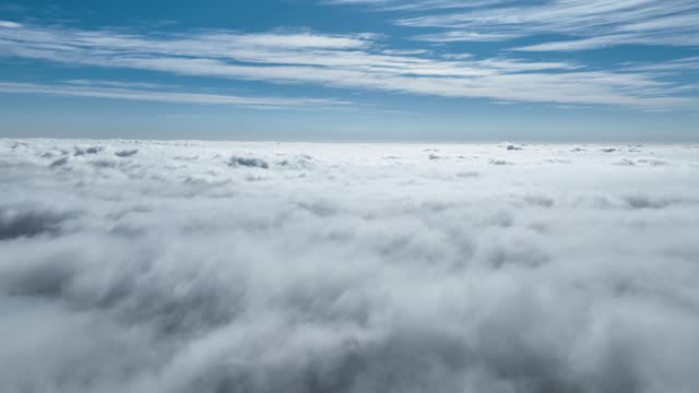 Drone Flying At Above Clouds In Blue Sky Skyline. Fog Morning Sky Clouds Scenery.