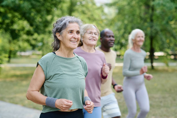 istock Senior people jogging in the park 1686535058