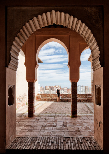 A view through an ornate window in the Alcazaba moorish fortress, Malaga