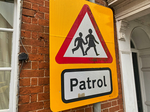 Photograph of a school patrol road warning sign