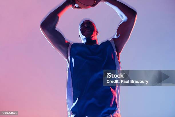 Basketball Player Holding Ball Stock Photo - Download Image Now - Basketball - Sport, 25-29 Years, Adult