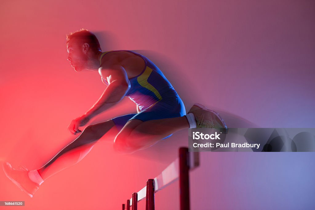 Desfocado vista do Atleta de salto de obstáculos - Foto de stock de Velocidade royalty-free