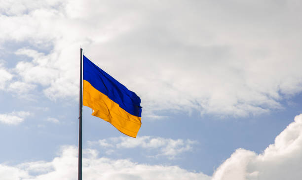 istock Ukrainian flag blowing on the wind with free sky background space 1686615221