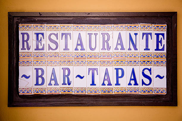 Tapas Restaurant Sign Rustic ceramic sign advertising a tapas restaurant and bar, Spanish cuisine puerto rican culture stock pictures, royalty-free photos & images