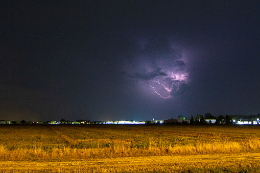 In meteorology, lightning is an atmospheric phenomenon linked to atmospheric electricity which consists of a large electrical discharge that occurs between two bodies with a high difference in electrical potential.