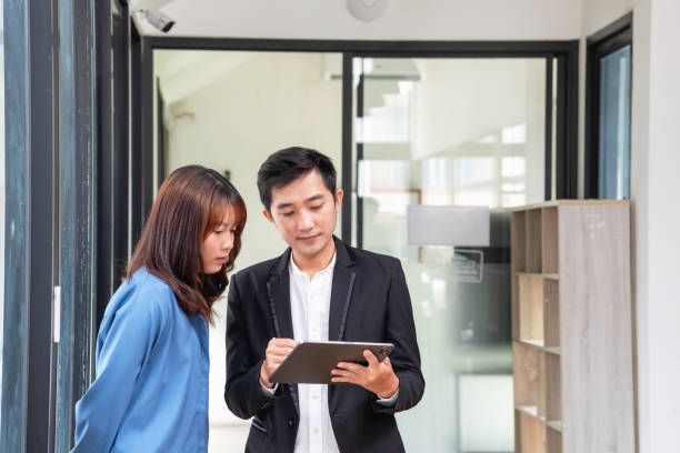istock They are working, thinking, and planning on the tablet of a business team developing a project. The technology marketing group works with web research. Office workers are looking at tablets together. 1686623735