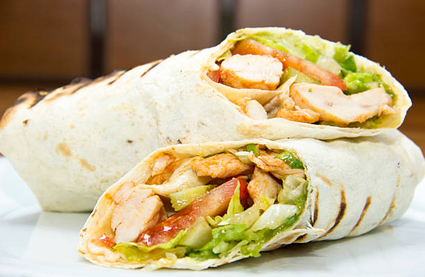 Döner kebap - Chicken Salad Sandwich Wrap Chicken Wrap Sandwich with Salad, turkish food wrap sandwich photos stock pictures, royalty-free photos & images