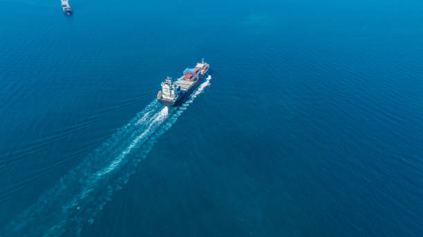 istock Stern of large cargo ship import export container box on the ocean sea on blue sky back ground concept transportation logistic and service to customer and supply change 1686655515